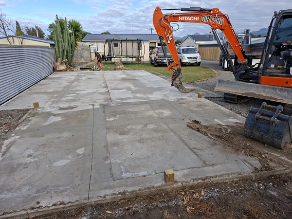Existing garage slab on subdivided Renwick section being broken up for demolition